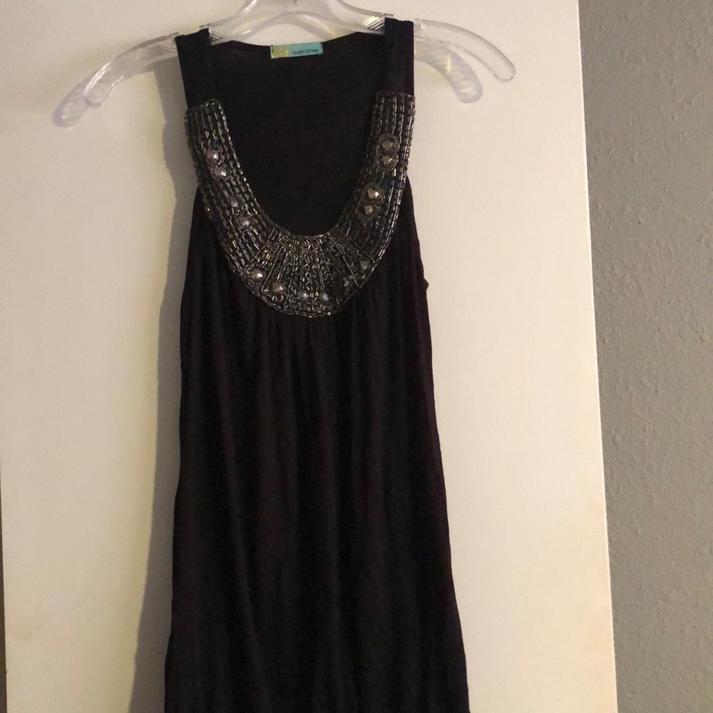 Long black embellished top